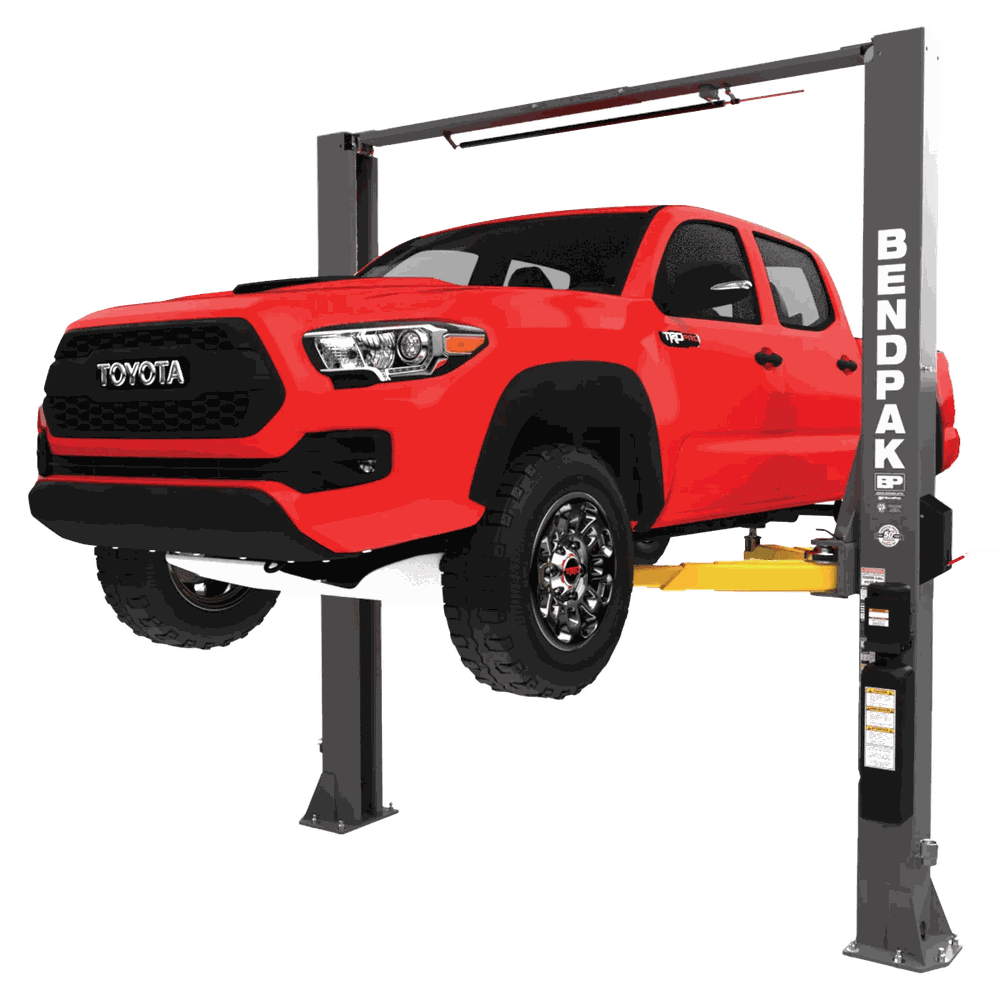 BendPak two-post lift raising a pickup truck